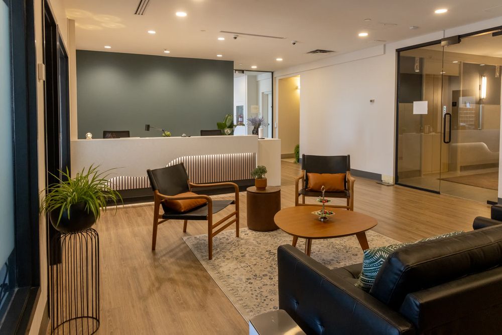 Finished commercial office space renovated by Creek Ocean Construction